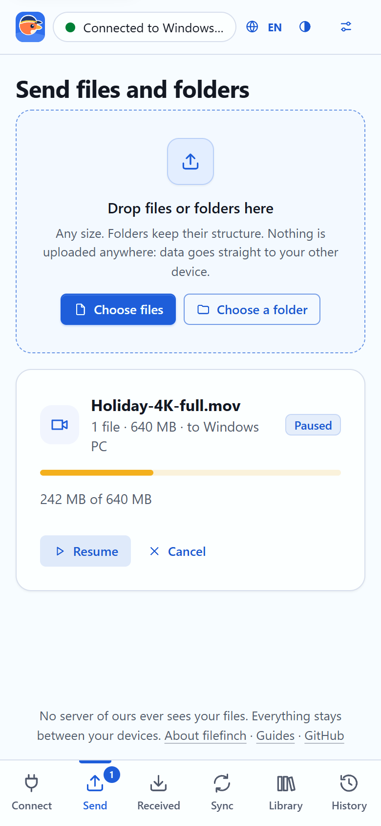 A transfer in the app with pause and resume controls
